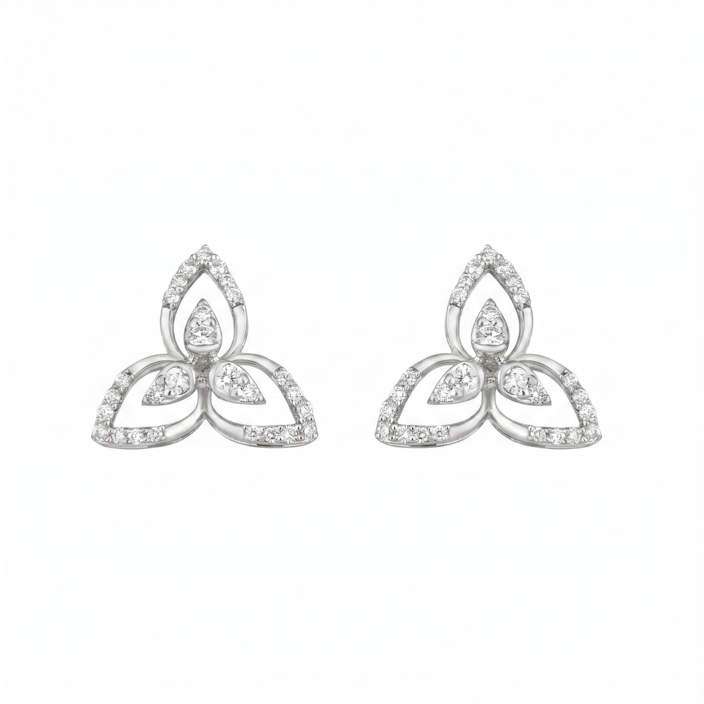 Pair of white gold and diamond earrings on a white background

