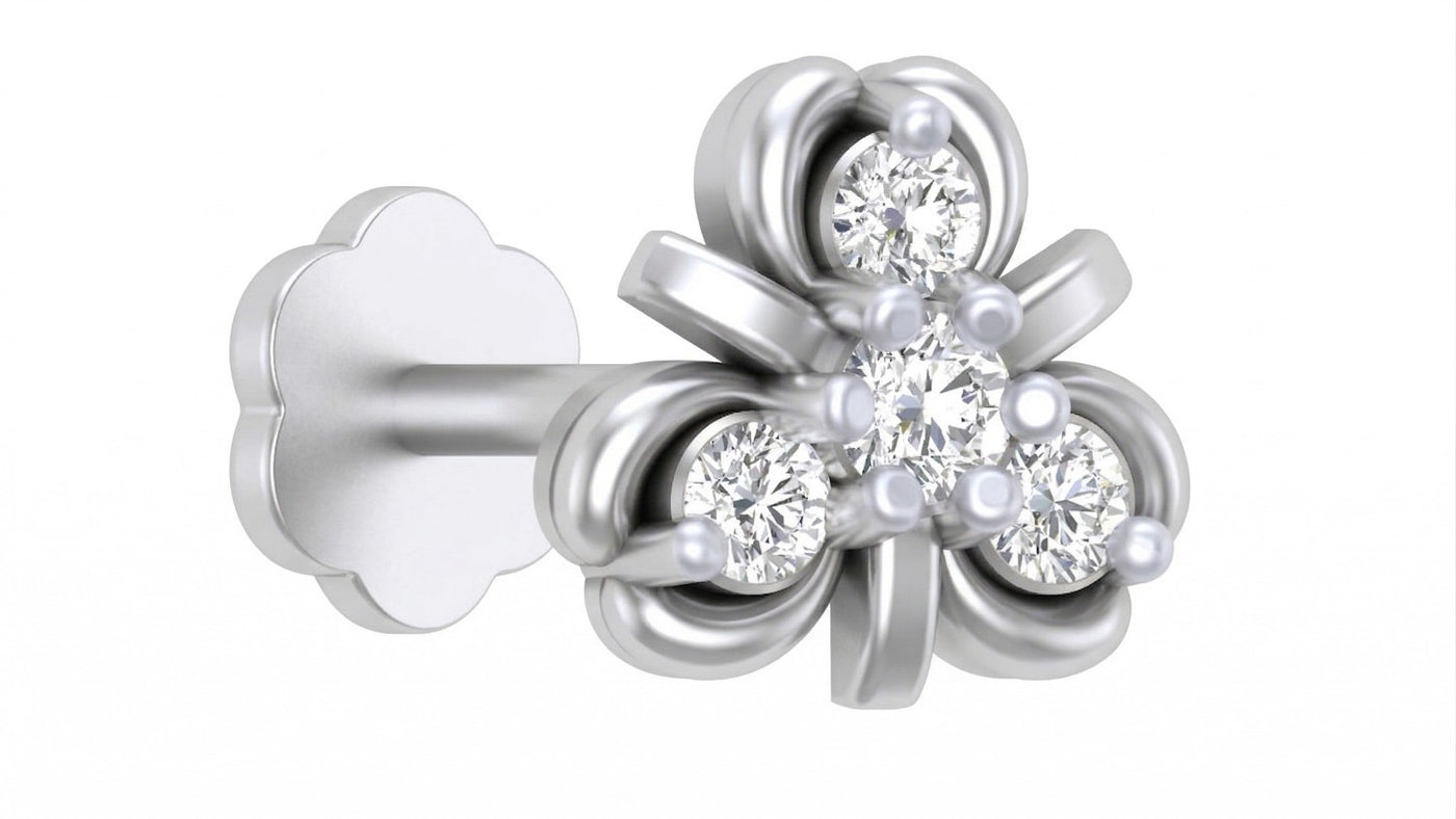 White gold and diamond stud nosepin with floral design and clear gemstones on a white background