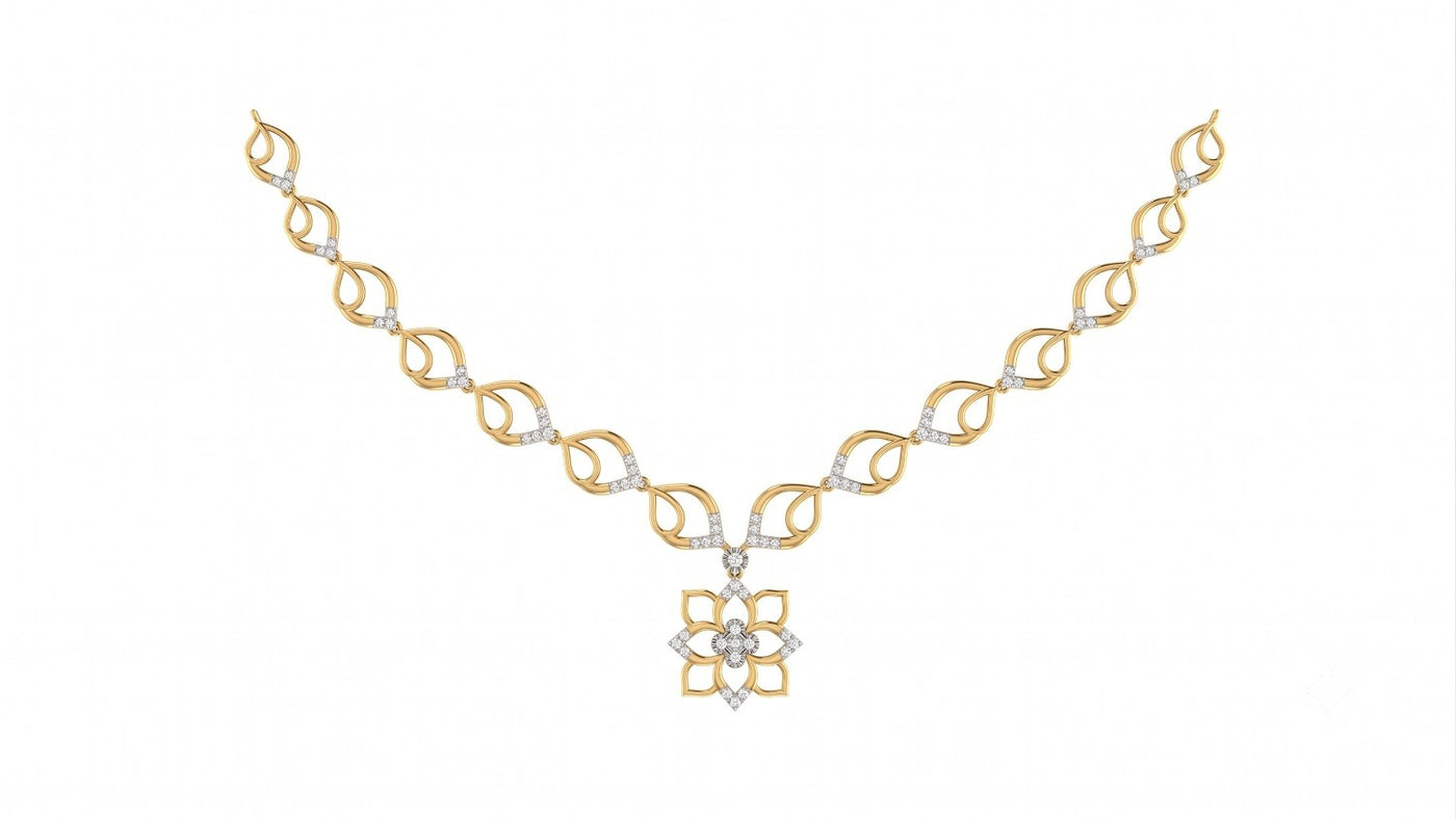 A yellow gold and diamond necklace featuring a central floral design, displayed on a solid white background.