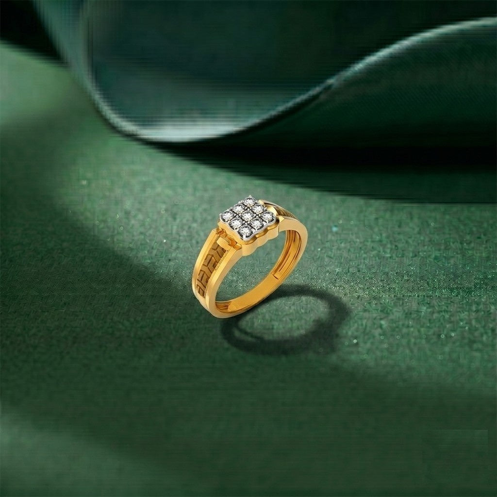Gold ring with diamond accents on a green fabric background