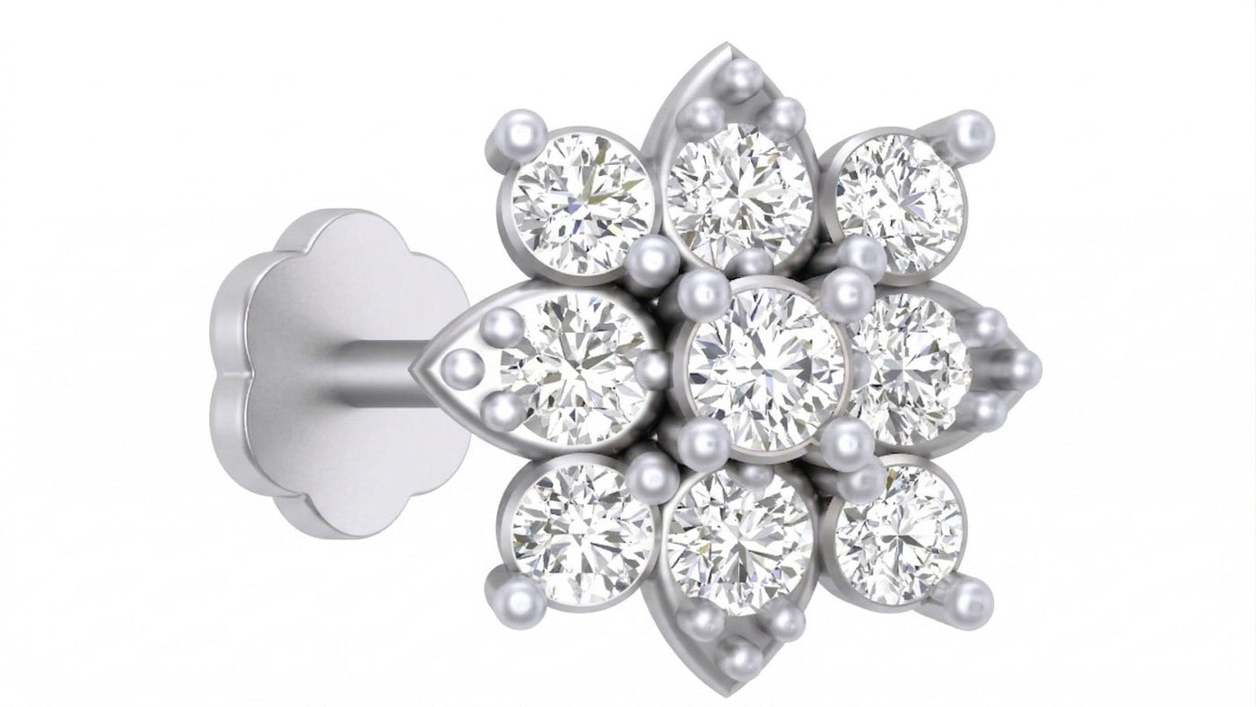 White gold and diamond stud nosepin-like stones on a white background