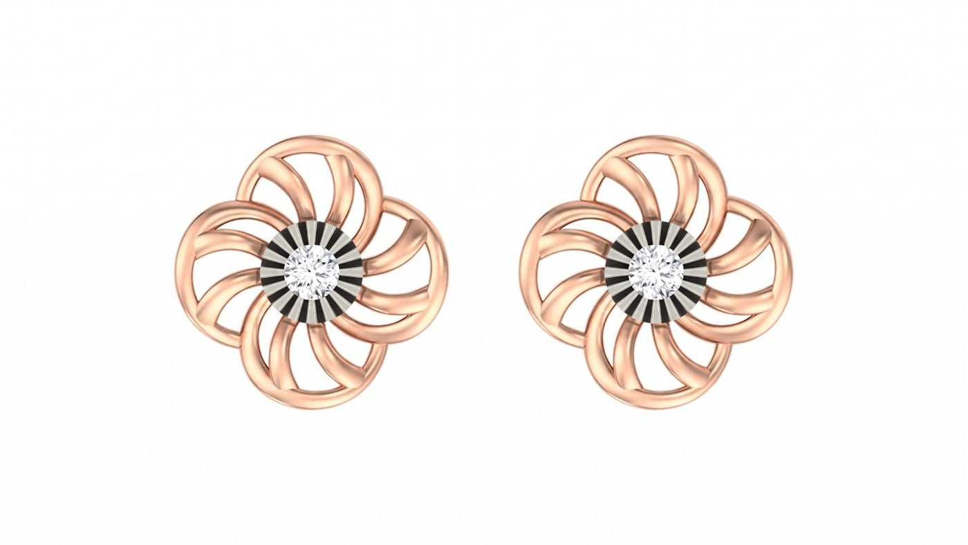 Rose gold and diamond floral stud earrings on a white background