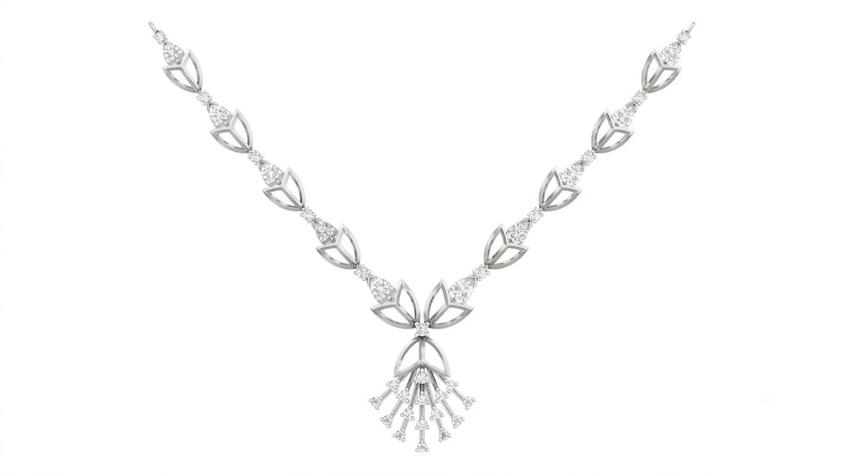 A white gold and diamond necklace featuring a cascading diamond drop, set against a plain white background.