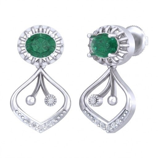 White gold and diamond earrings with emerald on a white background.