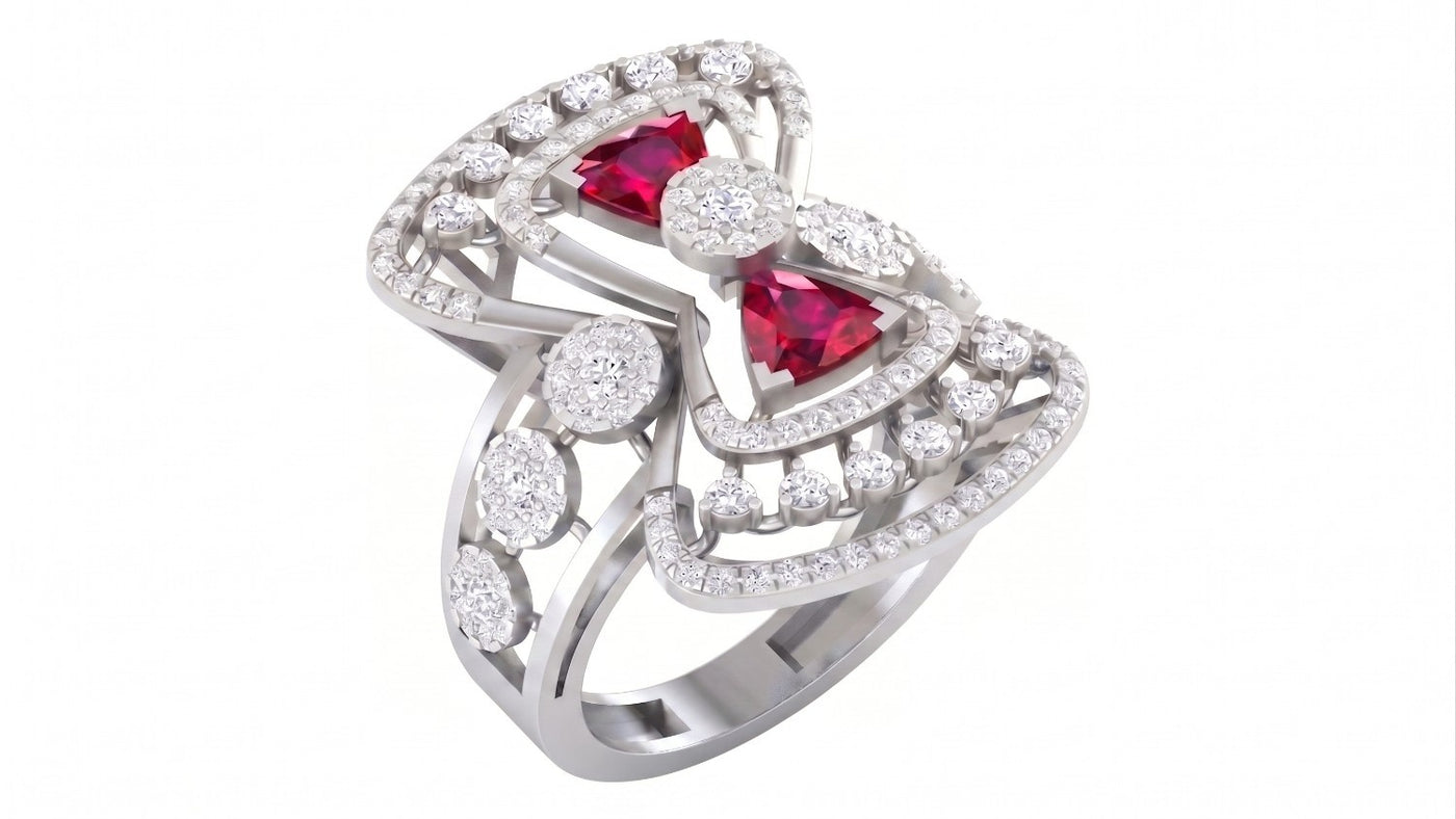 Elegant ring with red gemstones and diamond accents on a white background
