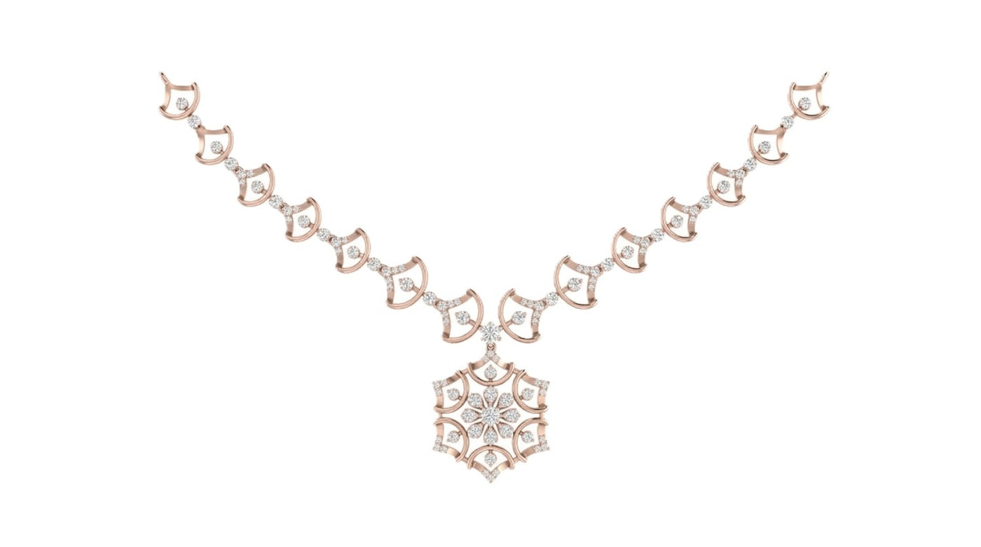 Rose gold necklace with a snowflake design on a white background