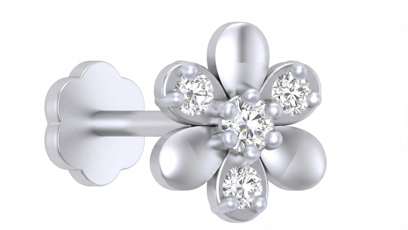 white gold and diamond stud nose pin on a white background