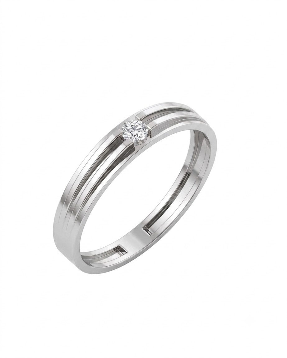 A white gold and diamond band ring with a single round-cut diamond set in the center, shown on a plain white background.