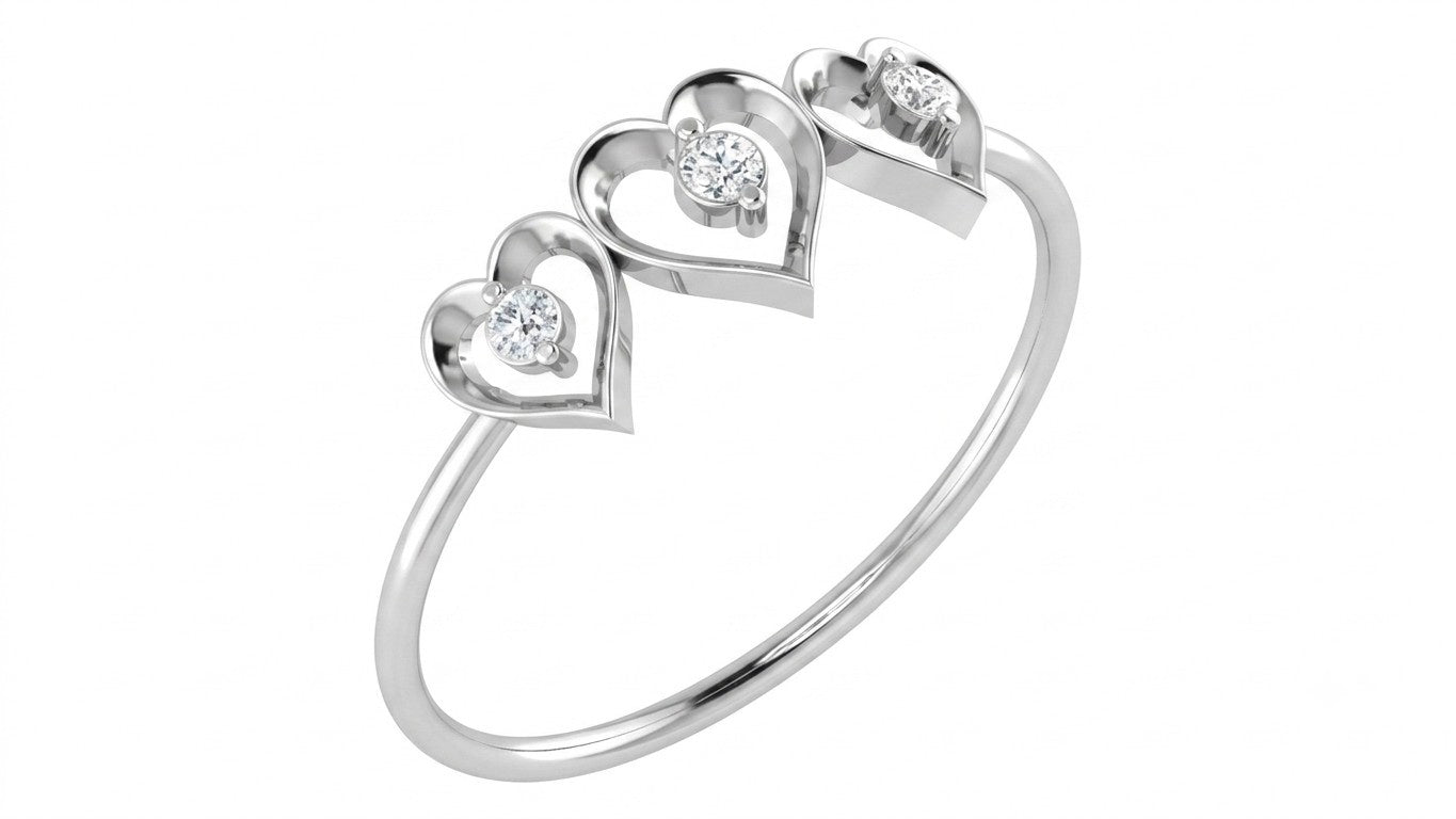 White gold ring with heart-shaped designs and diamonds on a white background
