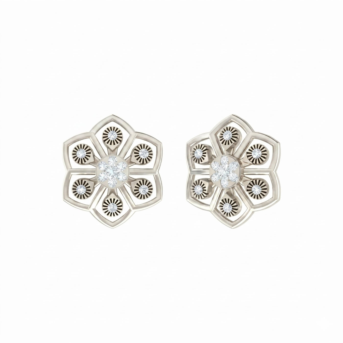 White gold and diamond floral stud earrings on a white background