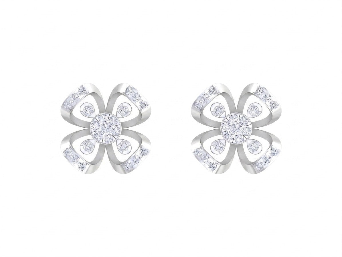 A pair of white gold and diamond floral stud earrings on a white background.