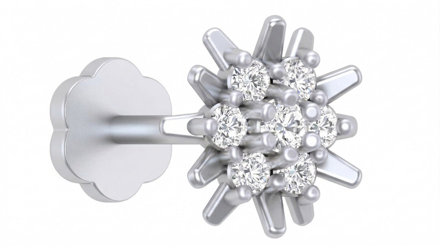 white gold and diamond stud nose pin on a white background