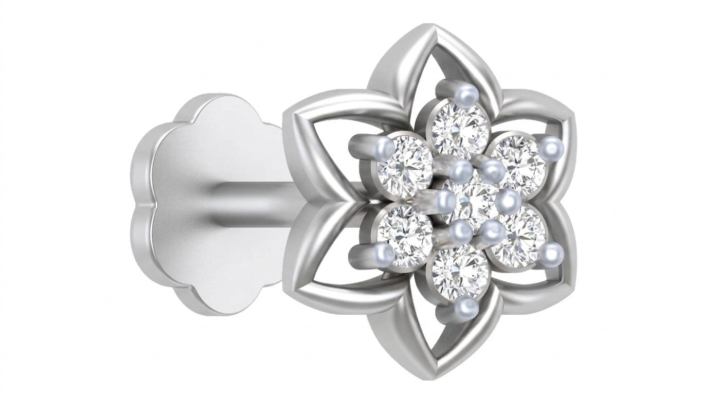 White gold and diamond stud nose pin with clear gemstones on a rose gold background