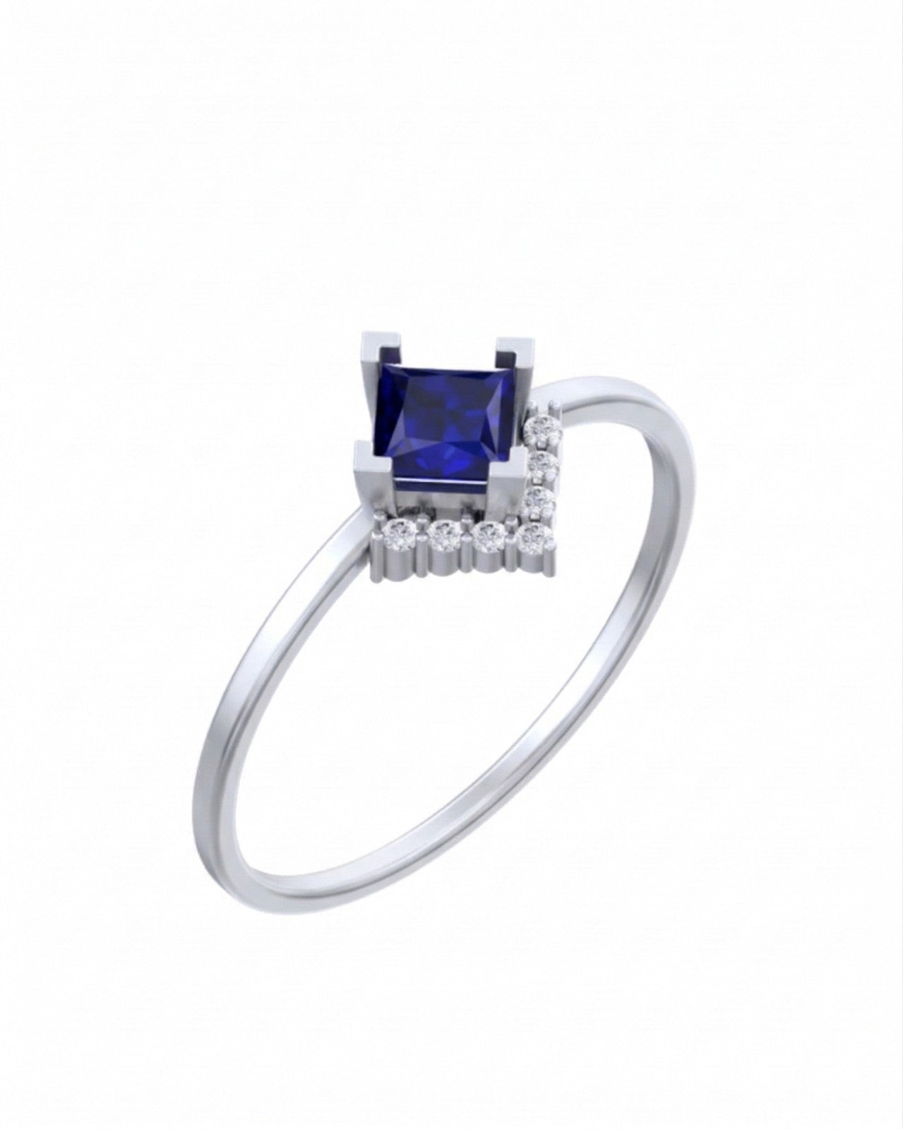 White gold ring with a blue gemstone and diamond accents on a white background