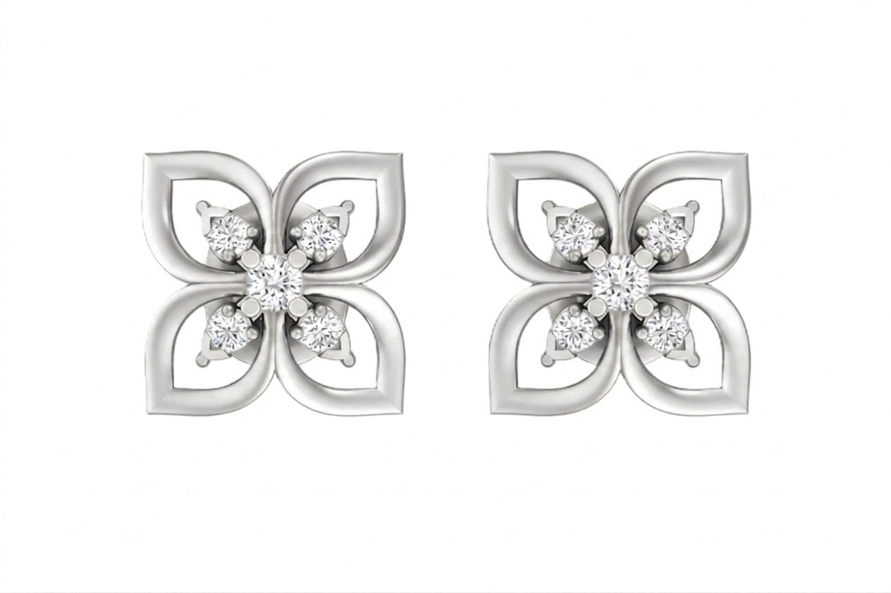 White gold and diamond earrings with floral design on a white background