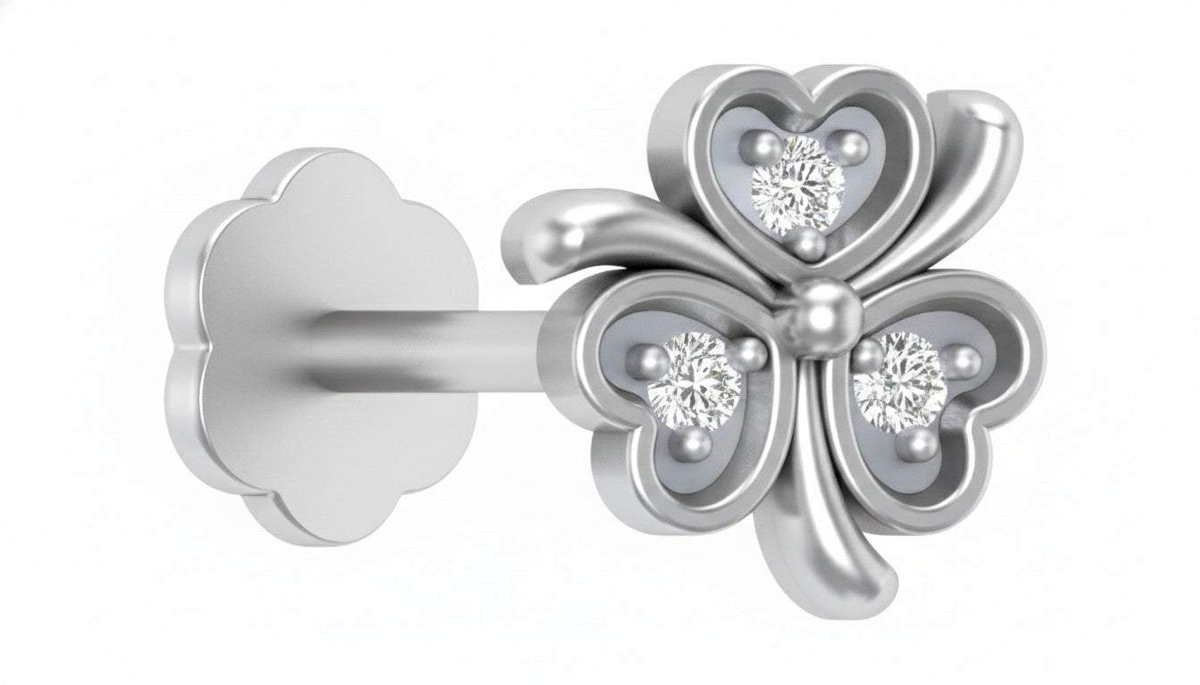 Elegant white gold and diamond nose pin with delicate heart-inspired design.