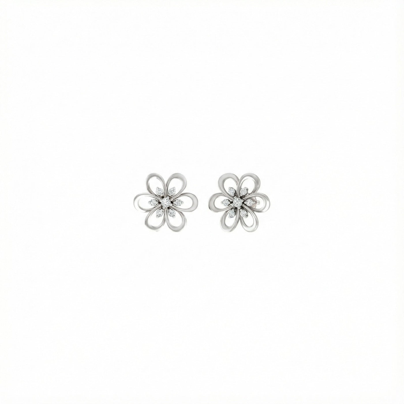 White gold and diamond stud earring with floral-design on a white background.