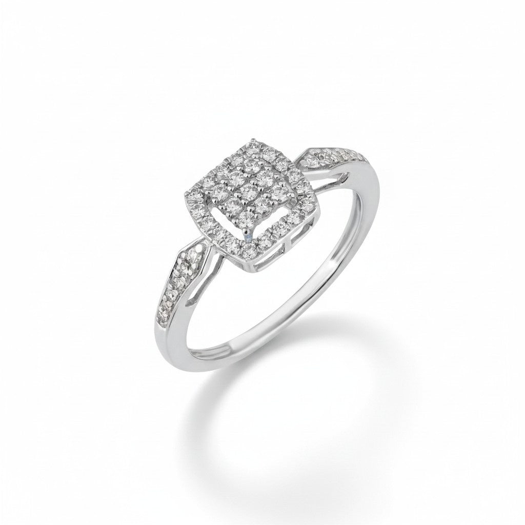 White gold ring with diamond accents on a white background