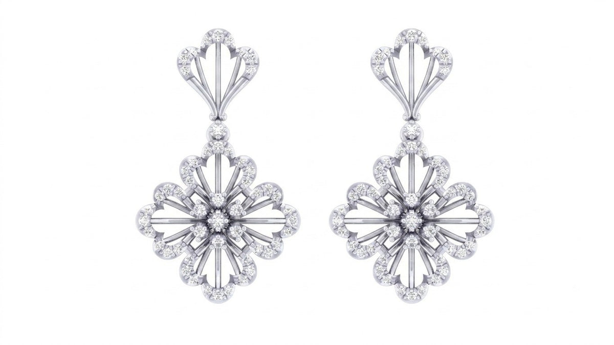 White gold and diamond floral-shaped earrings on a white background