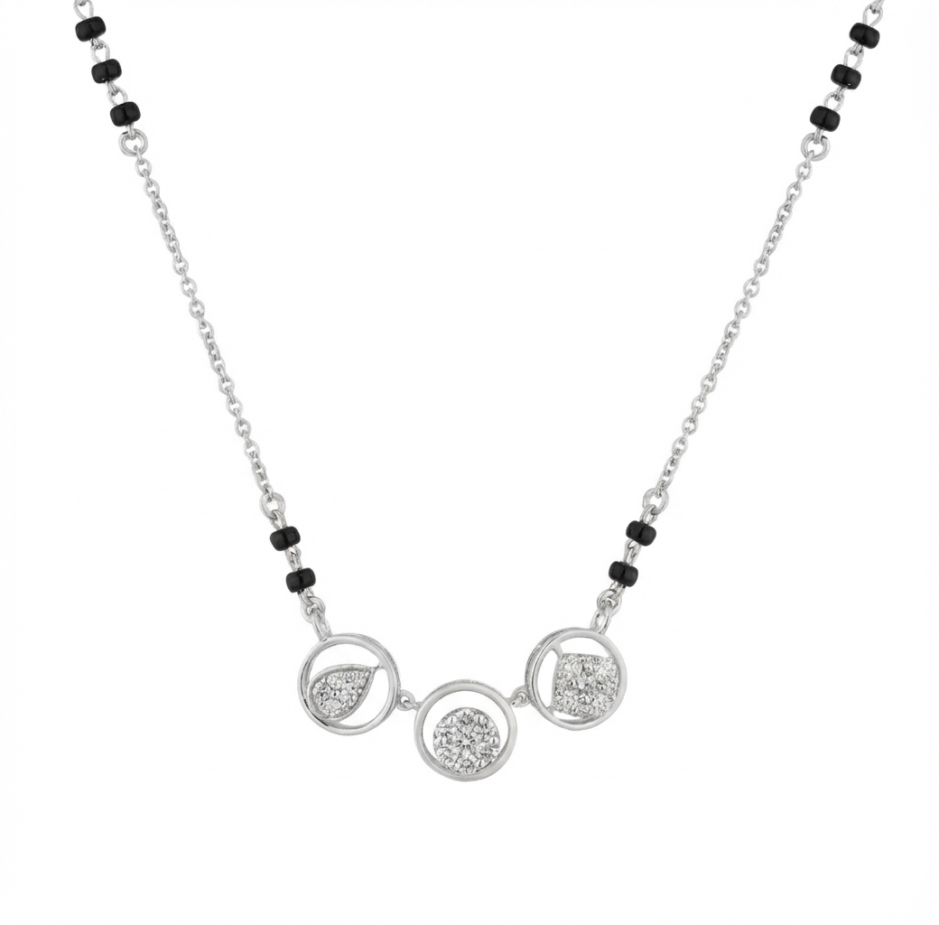 Mangalsutra with circular design and black beads on a white background