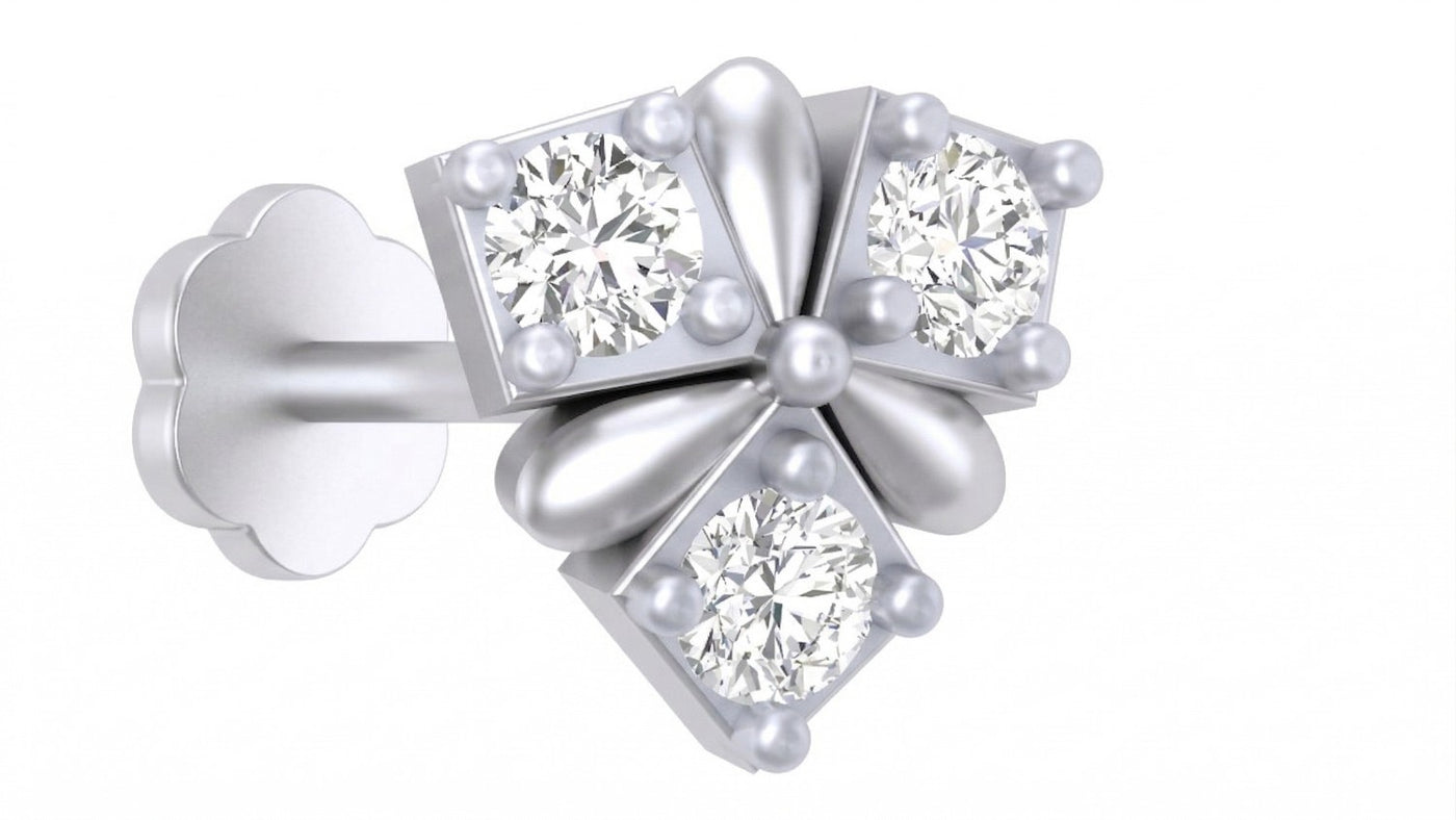 White gold and diamond stud nose pin on a white background