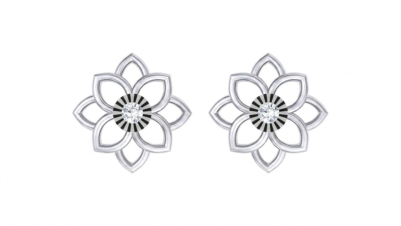White gold and diamond floral stud earring on a white background.