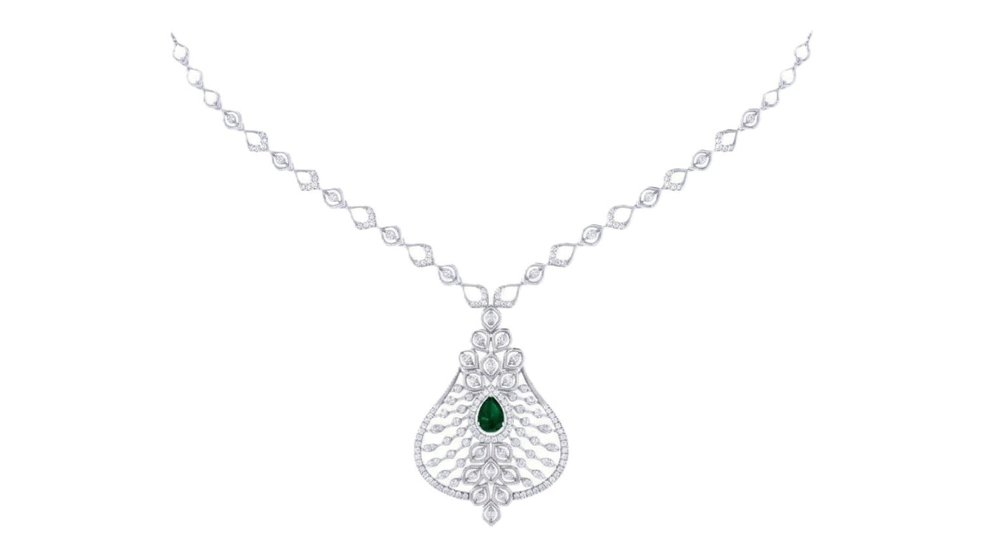 White gold necklace with a green gemstone on a white background