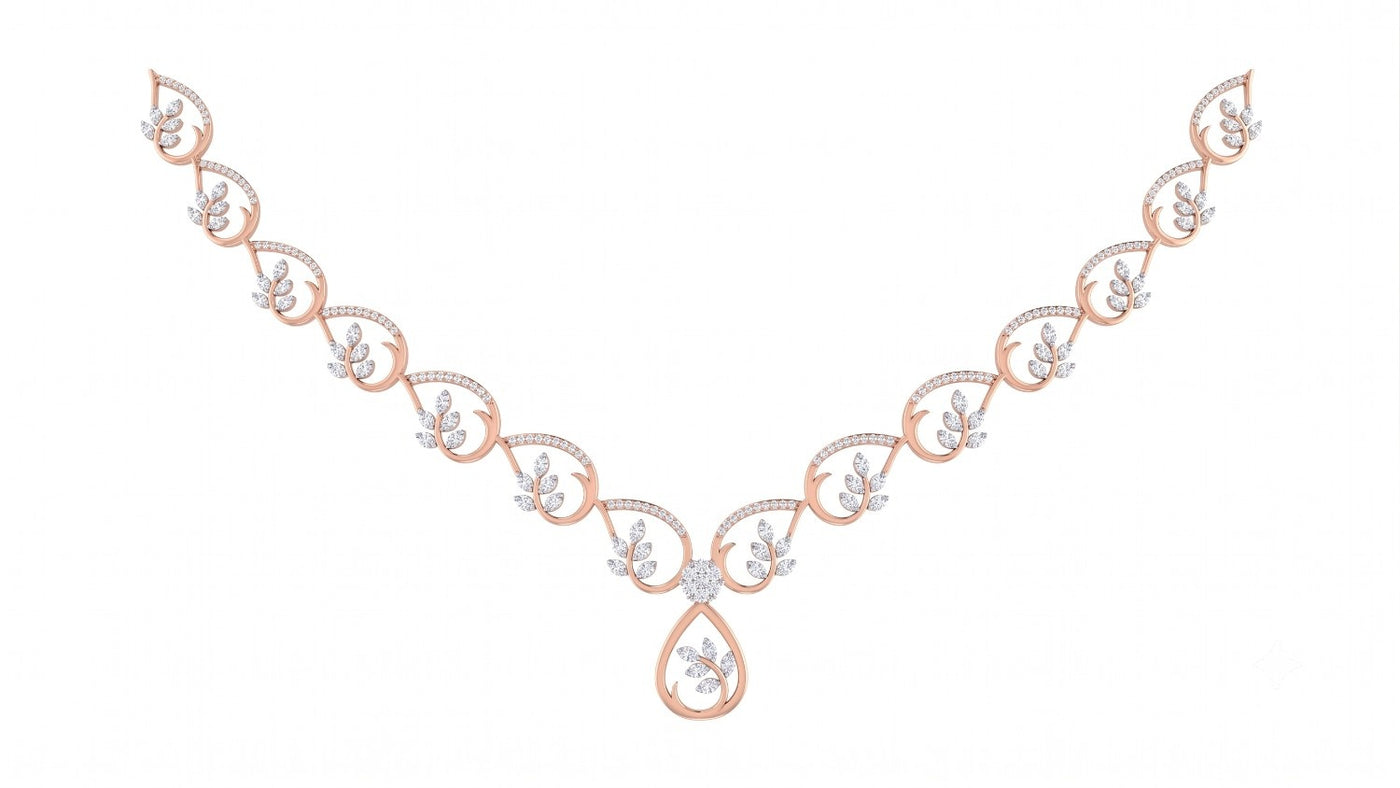 Rose gold and diamond necklace featuring a teardrop shaped on a plain white background.