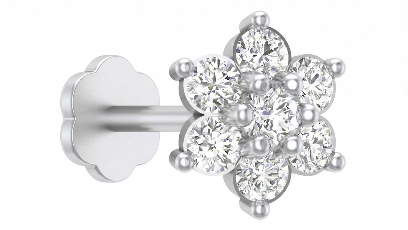 white gold and diamond stud nose pin with clear gemstones on a white background