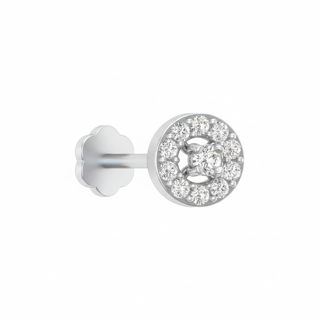 white gold and diamond stud nose pin with a clear gemstone on a white background