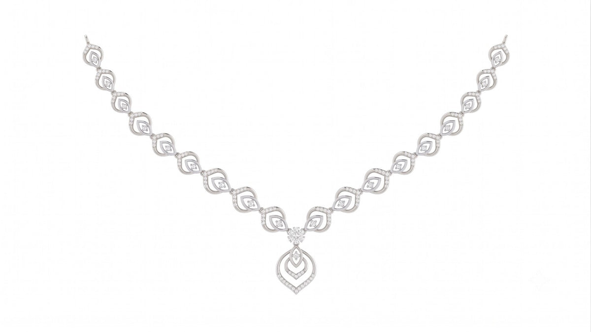 A delicate white gold and diamond necklace set, displayed on a solid white background.