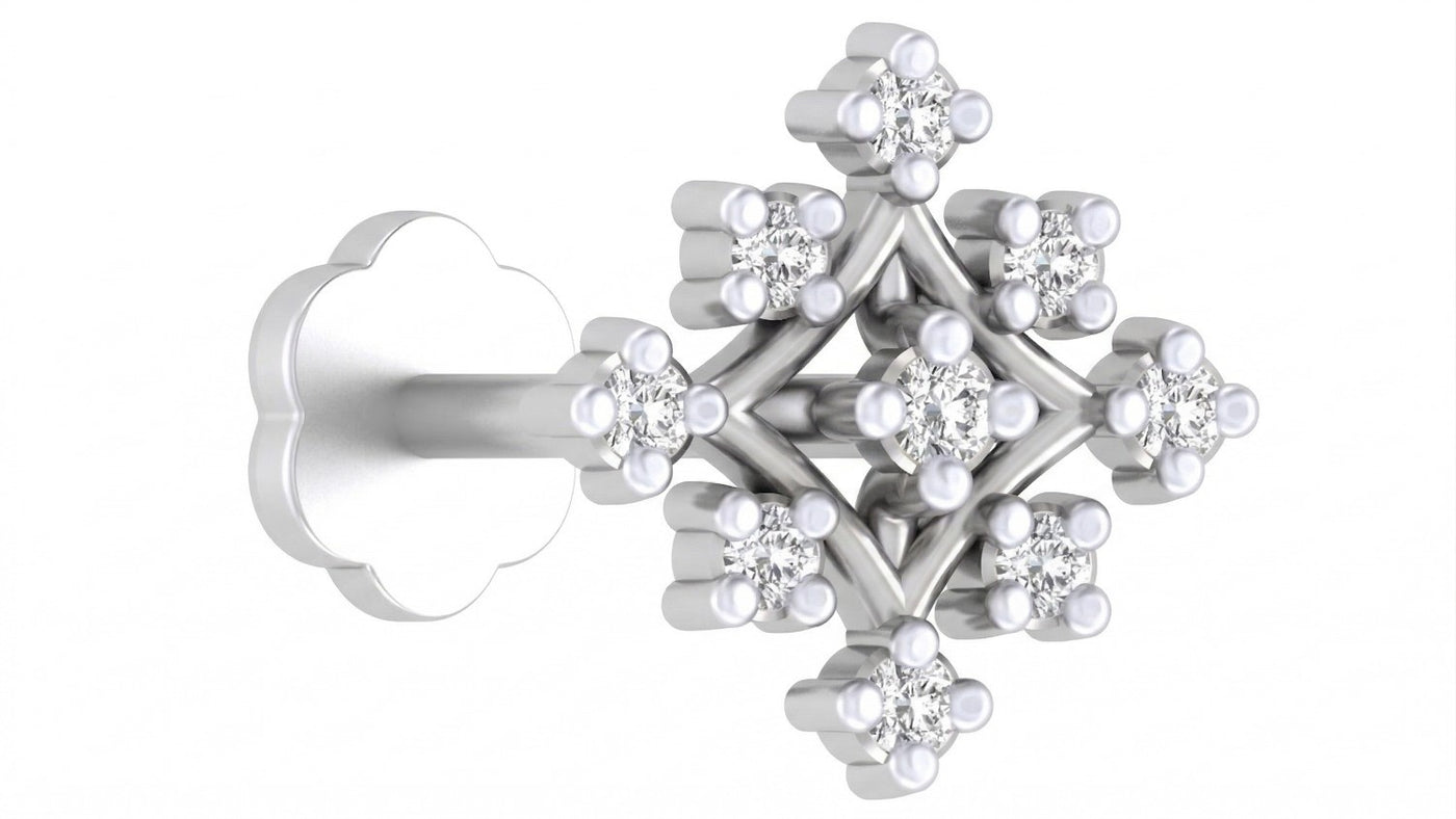 White gold and diamond stud nose pin with floral design on a white background