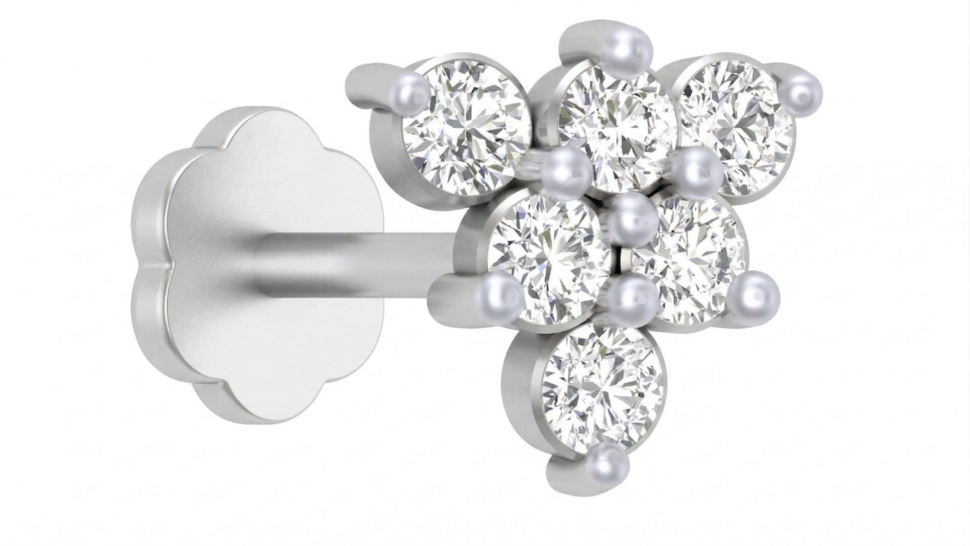 White Gold and diamond stud nose pin-like stones on a white background