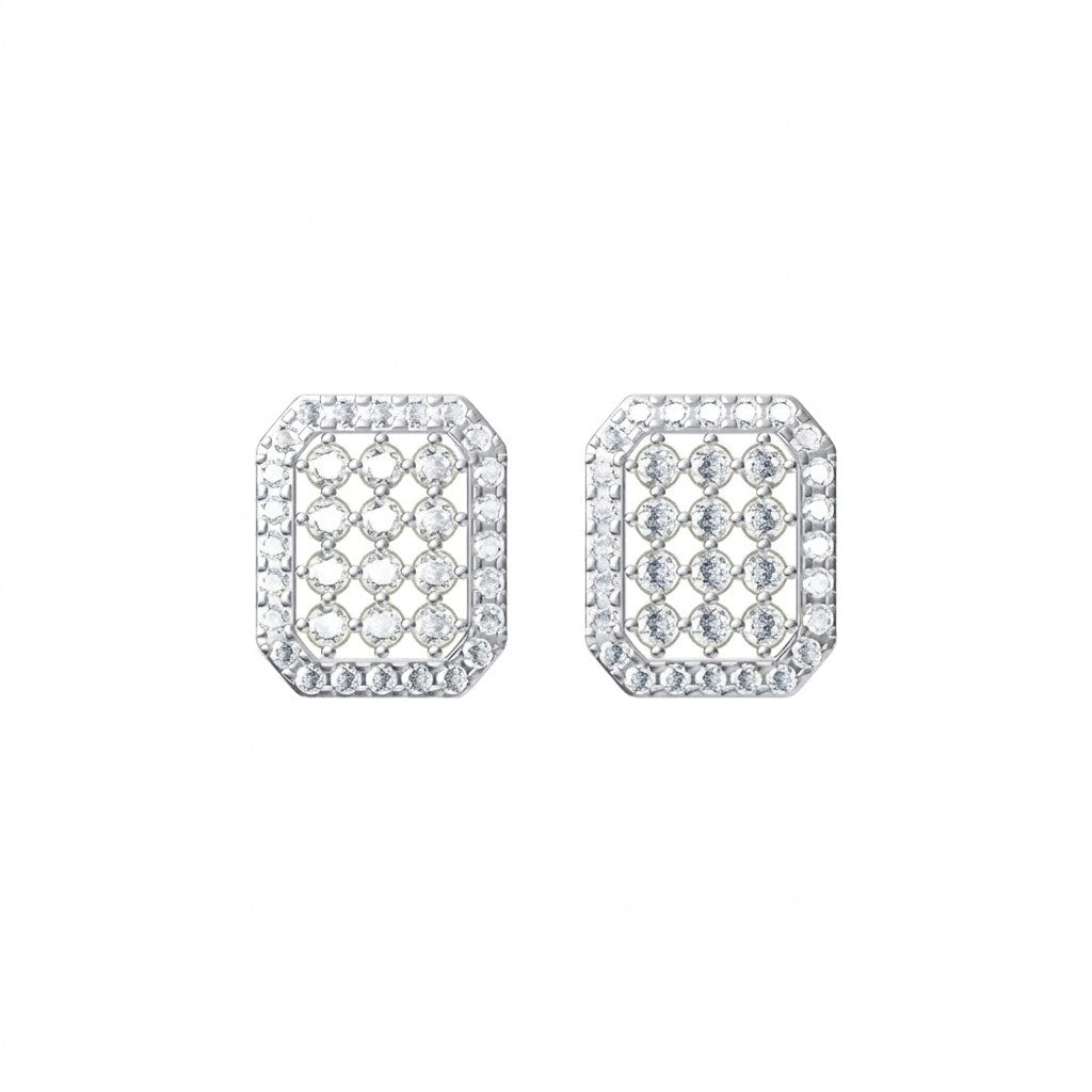 Pair of white gold and diamond earrings on a white background