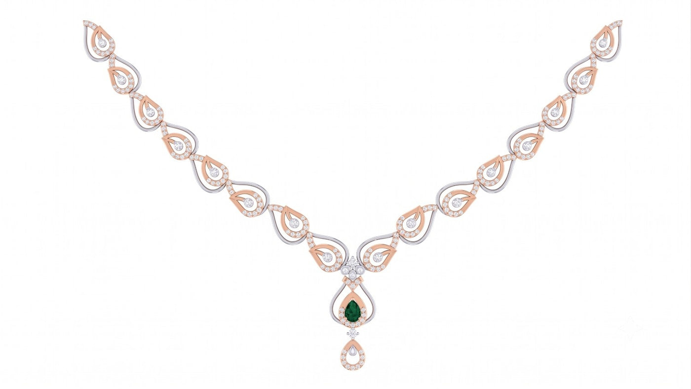 A rose gold and diamond teardrop motifs with a central green emerald, set against a plain white background.