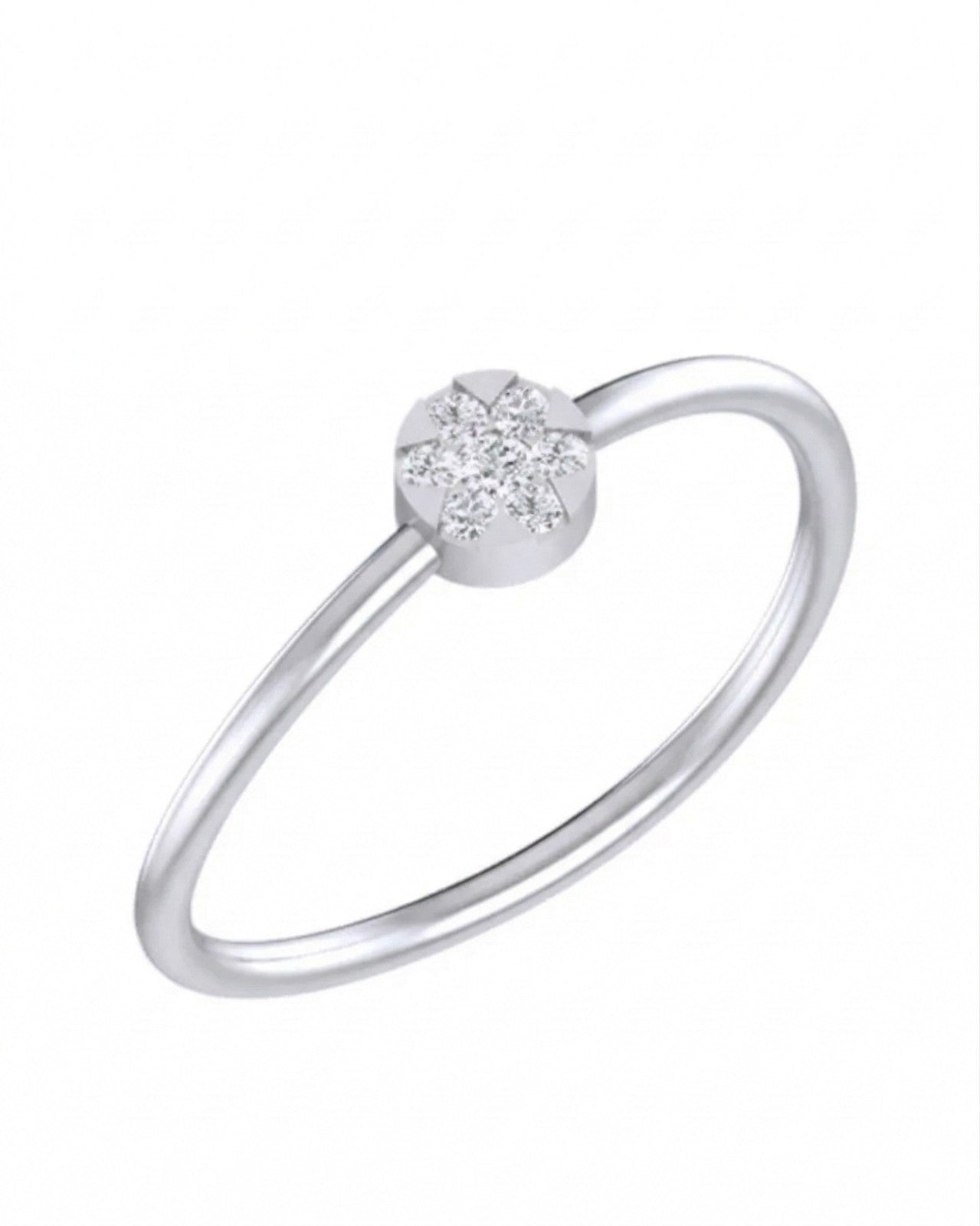 White gold ring with a small gemstone on a white background