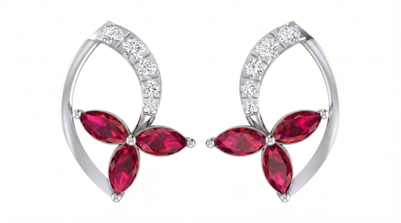 White gold and diamond stud earring with ruby gemstone on a white background.