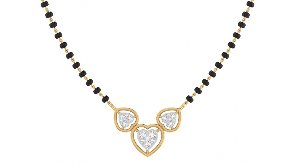 Yellow gold & diamond heart mangalsutra on white background