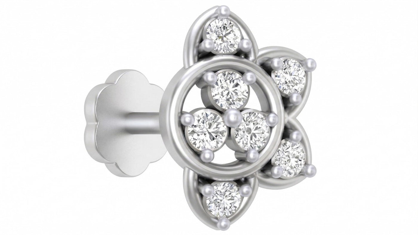 White gold and diamond stud nose pin-like stones on a white background