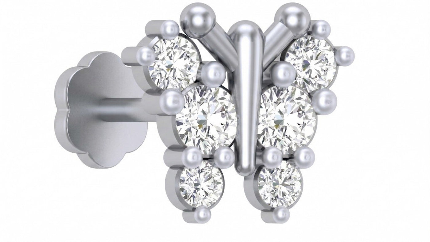 White gold and diamond stud nose pin butterfly-shaped with clear gemstones on a white background