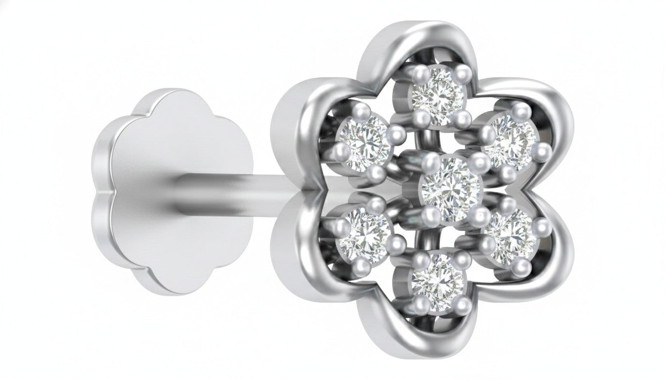 white gold and diamond stud nose pin on a white background