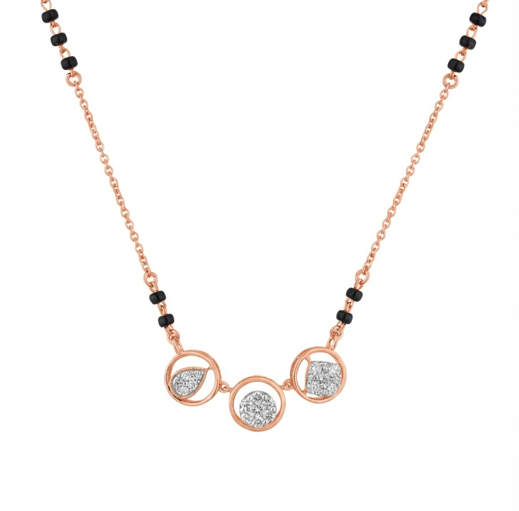 Rose gold mangalsutra with circular design and black beads on a white background