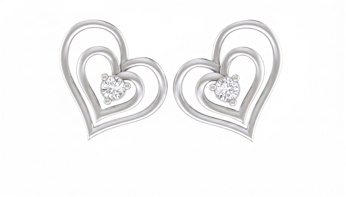 White Gold and diamond heart-shaped earrings on a white background