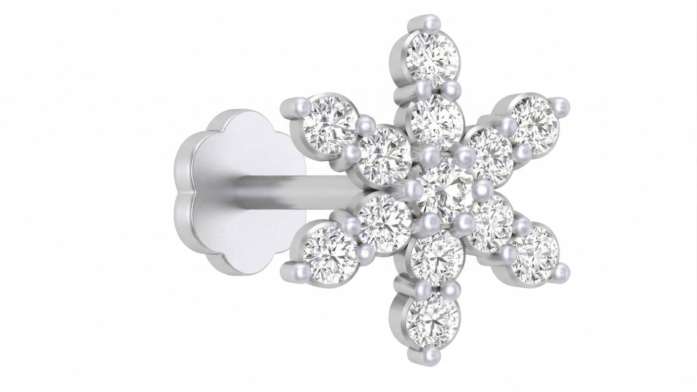 White gold and diamond stud nose pin on a white background