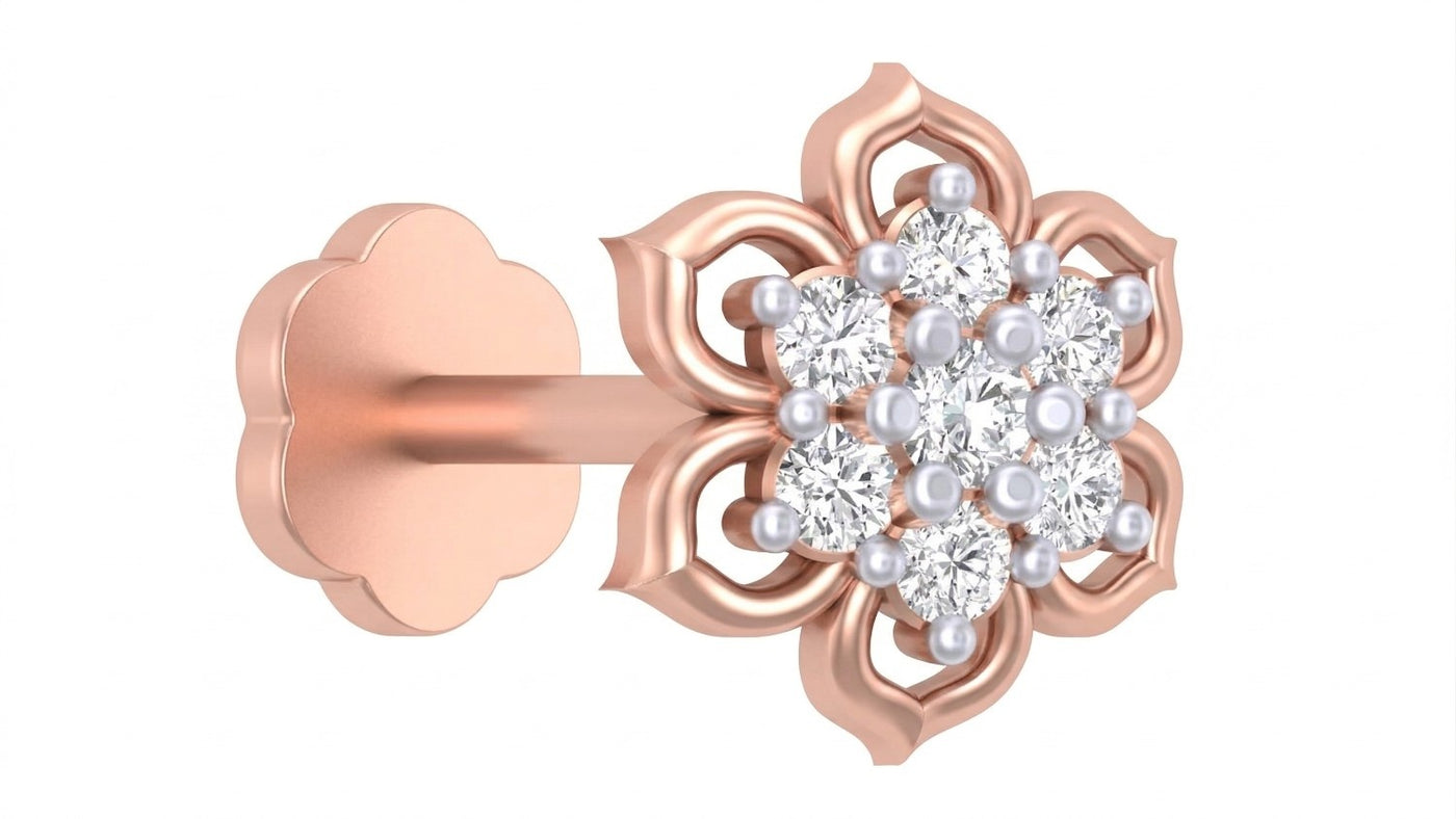 A single floral stud in rose gold and diamond stud nose pin featuring a cluster of clear round-cut stones and small white pearls at the center, with a matching gold flower-shaped backing on a plain white background.