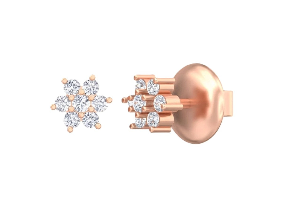 Rose gold and diamond floral stud earrings on a white background