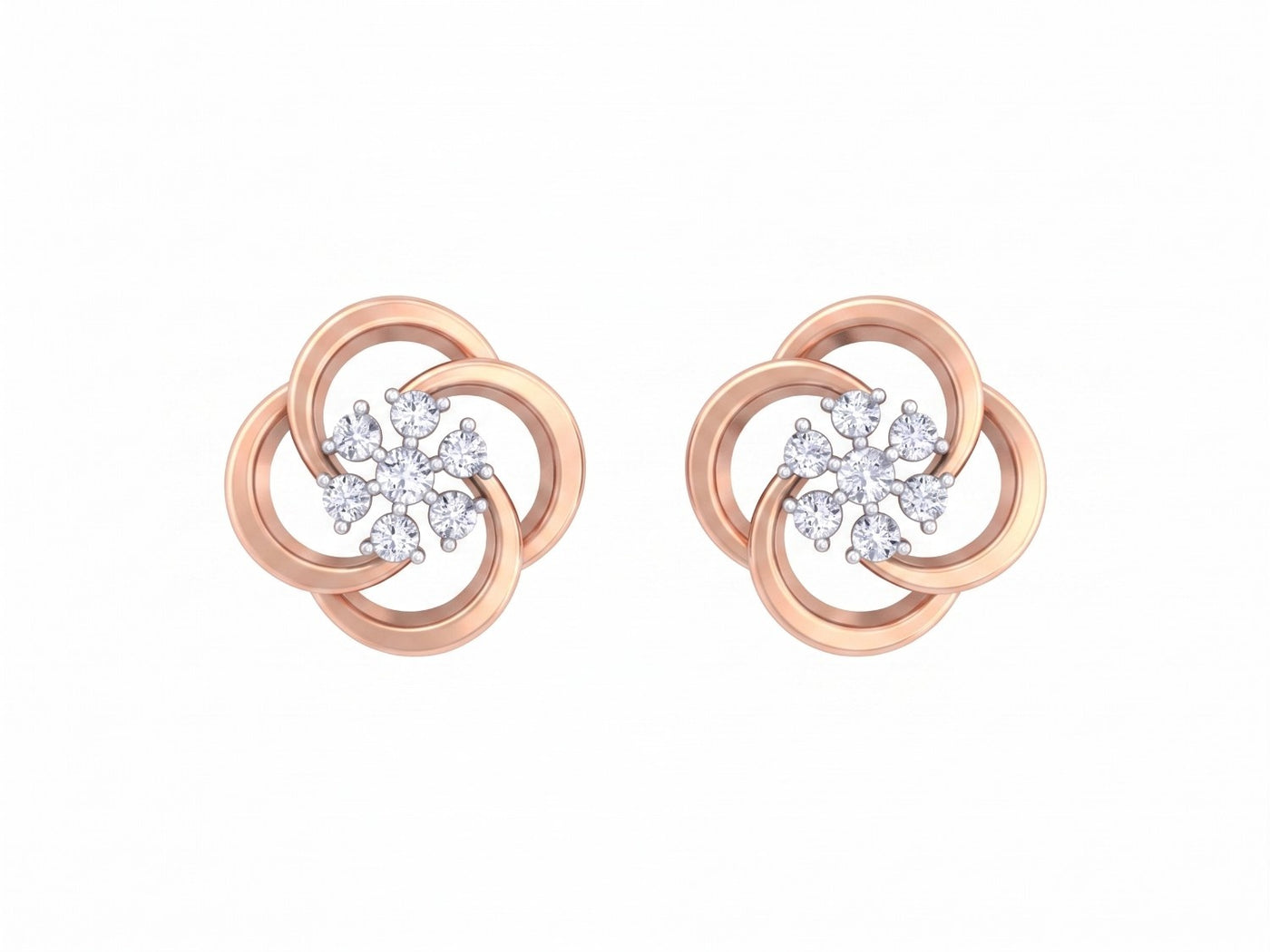 Rose gold and diamond stud earrings with floral-design on a white background.