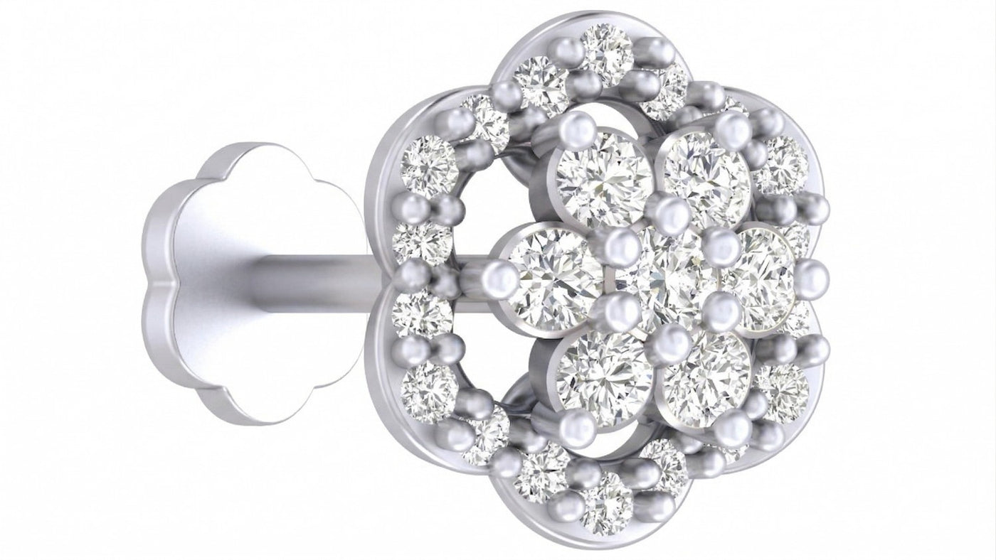 white gold and diamond stud nose pin on a white background