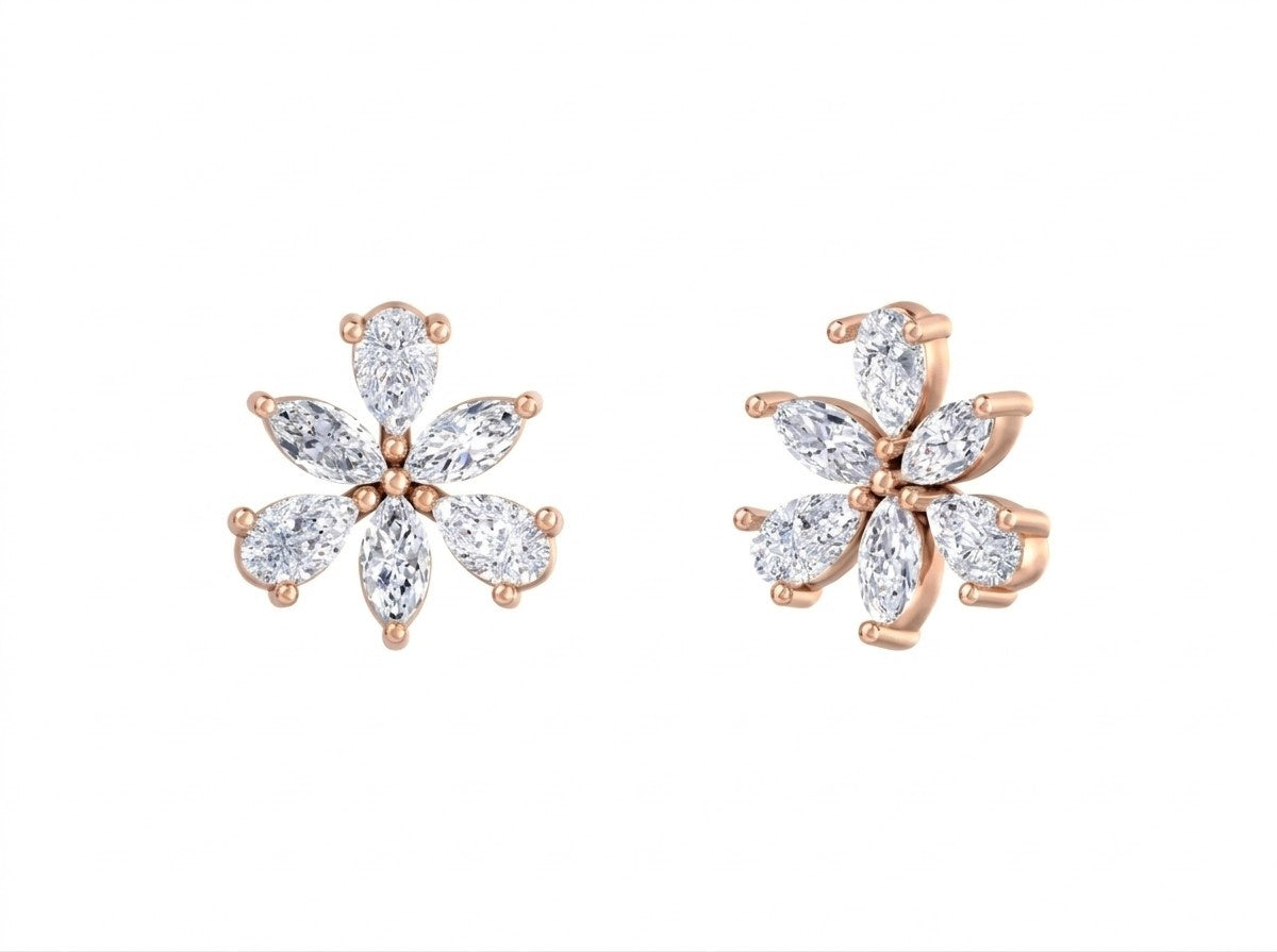 Rose gold and diamond flower-shaped earrings on a white background