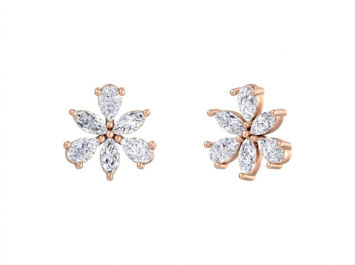 Rose gold and diamond flower-shaped earrings on a white background